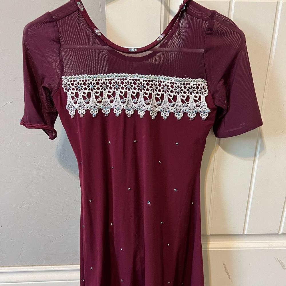 Rhinestone lyrical maroon costume. Only worn 3 times, it is in great condition.